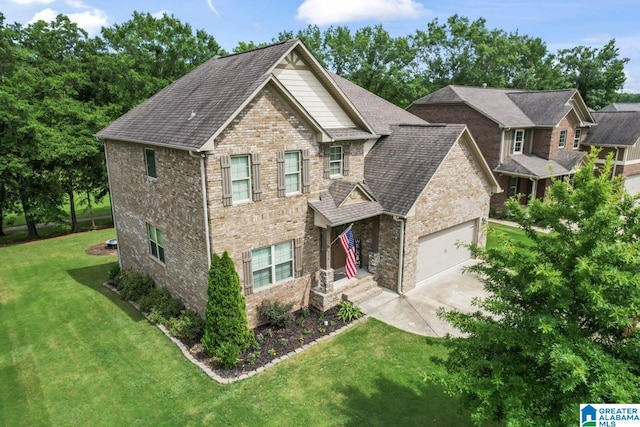 view of front facade featuring a front yard and a garage