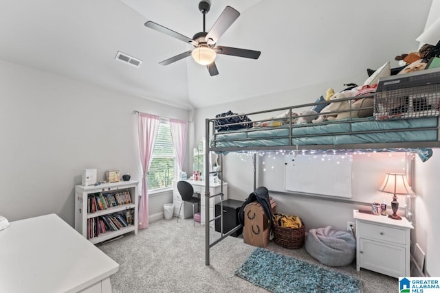 carpeted bedroom featuring ceiling fan and lofted ceiling