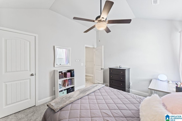 carpeted bedroom featuring vaulted ceiling and ceiling fan