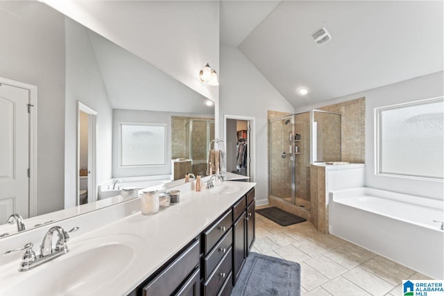 full bathroom featuring vanity, plus walk in shower, tile patterned flooring, toilet, and lofted ceiling