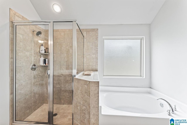 bathroom featuring plus walk in shower