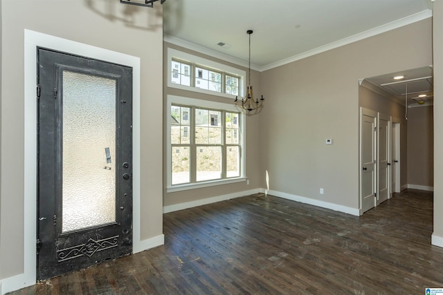 interior space with dark wood-style floors, baseboards, and crown molding