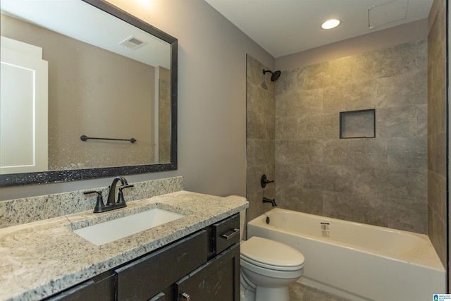 full bathroom with visible vents, shower / tub combination, vanity, and toilet