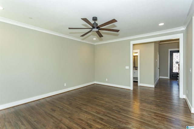 unfurnished room featuring dark wood-style floors, recessed lighting, baseboards, and crown molding