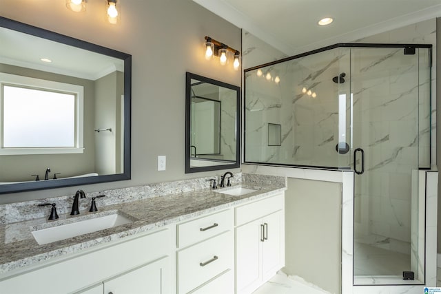 full bath with marble finish floor, a sink, a marble finish shower, and crown molding