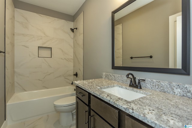 bathroom with marble finish floor, bathing tub / shower combination, vanity, and toilet