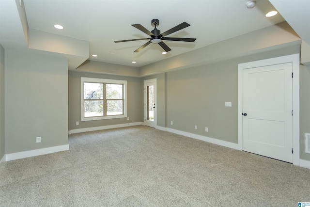 empty room with visible vents, baseboards, a ceiling fan, carpet, and recessed lighting