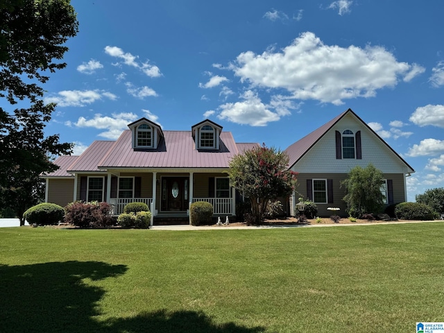 view of front facade with a porch and a front yard