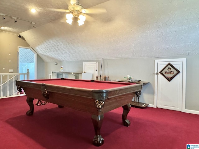 game room with a textured ceiling, ceiling fan, lofted ceiling, and billiards