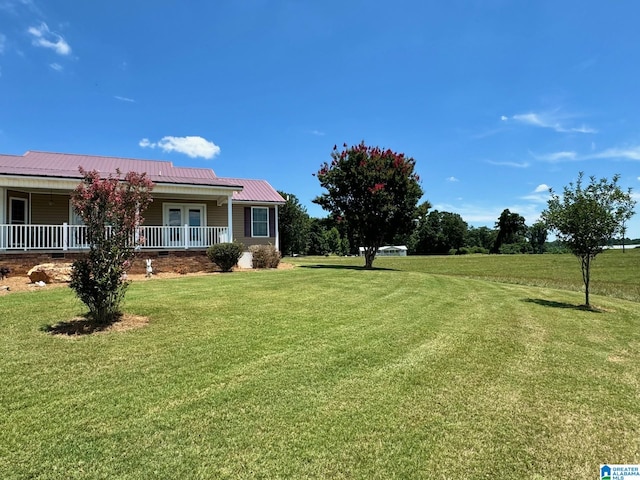 view of yard featuring a porch