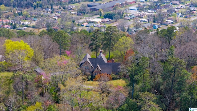 aerial view featuring a wooded view