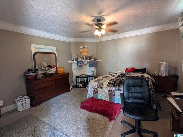 bedroom with ceiling fan, crown molding, and a textured ceiling