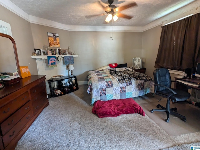 carpeted bedroom with ceiling fan, ornamental molding, and a textured ceiling