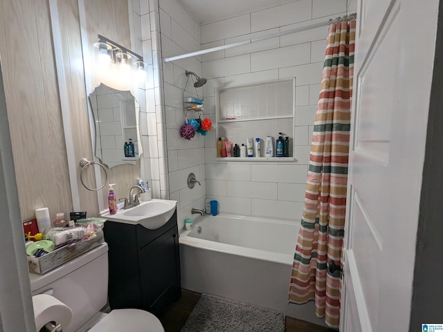 full bathroom with shower / bath combination with curtain, toilet, and vanity