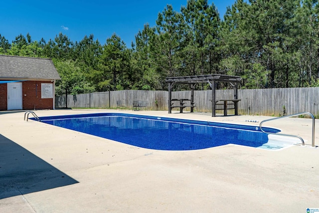 view of swimming pool featuring a pergola and a patio area