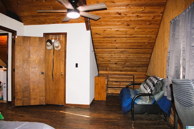 sitting room featuring ceiling fan, wood-type flooring, lofted ceiling, and wood ceiling