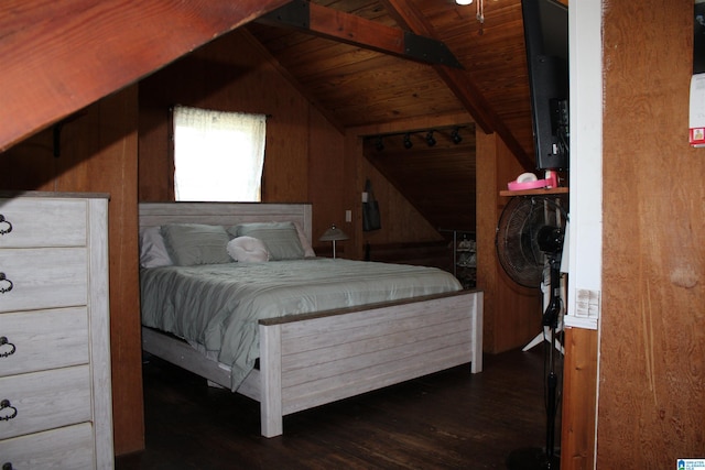 bedroom with wooden walls, dark hardwood / wood-style flooring, vaulted ceiling, and wood ceiling