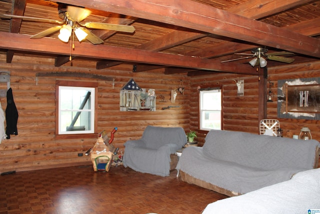 living room featuring parquet floors, log walls, and beamed ceiling