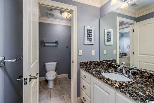 bathroom with vanity, tile patterned floors, ornamental molding, and toilet