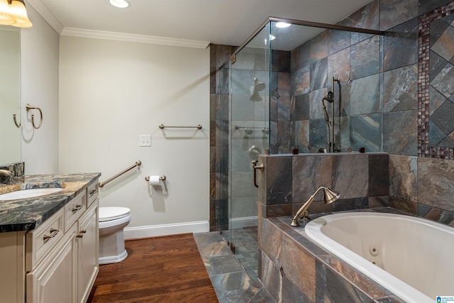 full bathroom with vanity, ornamental molding, shower with separate bathtub, and toilet