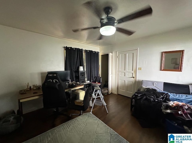 office space with ceiling fan and dark hardwood / wood-style flooring