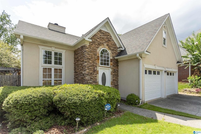 front facade with a garage