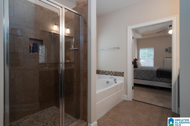 bathroom featuring independent shower and bath, ceiling fan, and tile patterned floors