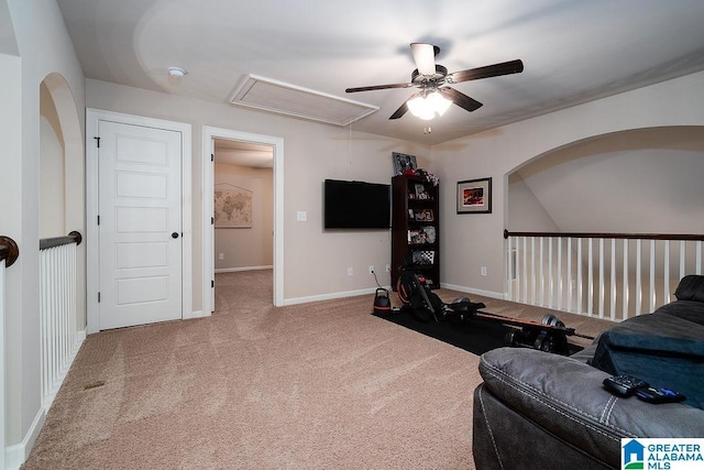 interior space featuring ceiling fan and carpet floors