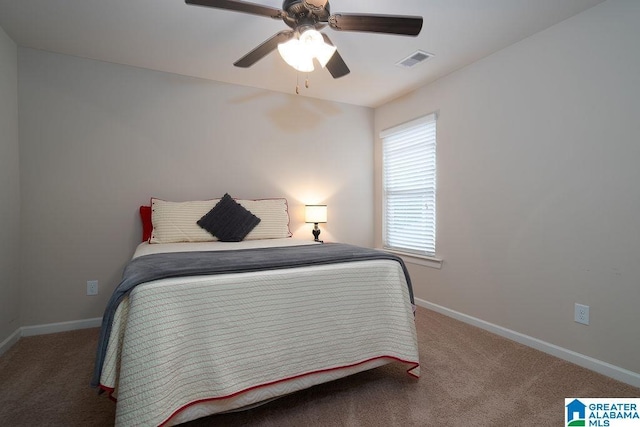 bedroom featuring ceiling fan and carpet floors