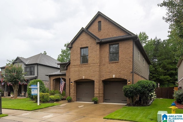 view of front facade featuring a front lawn and a garage