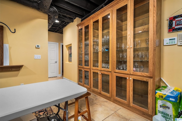 interior space with light tile patterned floors