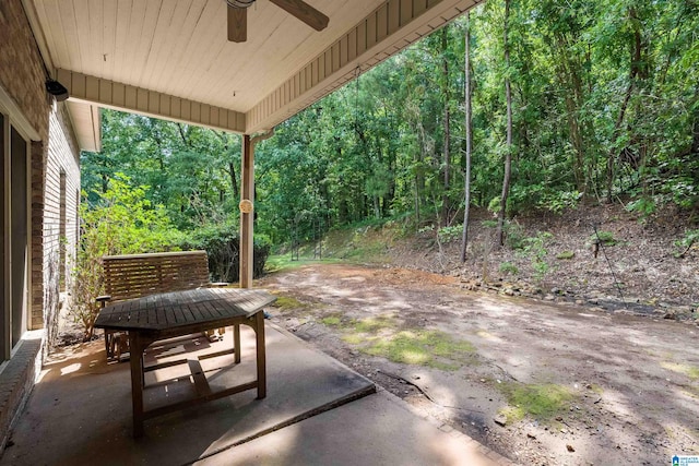 view of patio featuring ceiling fan