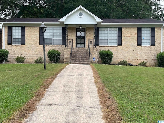 view of front of home with a front lawn