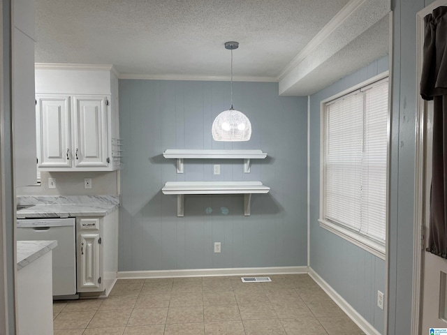 kitchen featuring white cabinets, crown molding, white dishwasher, a textured ceiling, and light tile patterned floors