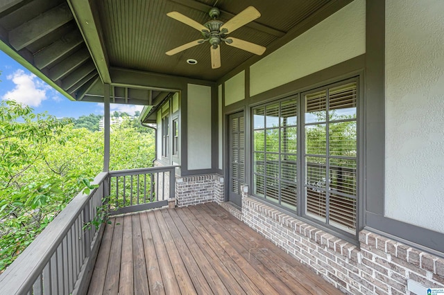 wooden terrace with ceiling fan