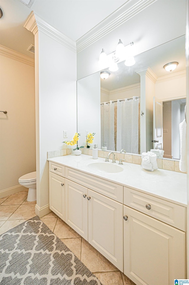 full bathroom with ornamental molding, tile patterned floors, and toilet