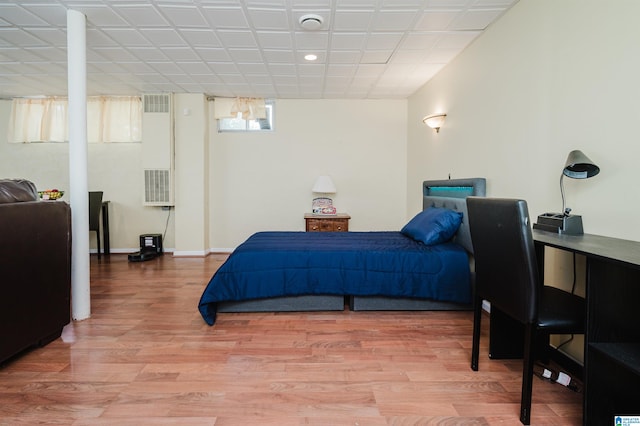 bedroom featuring hardwood / wood-style floors