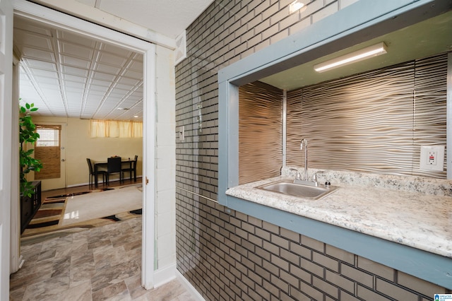 bathroom with vanity and tile patterned flooring