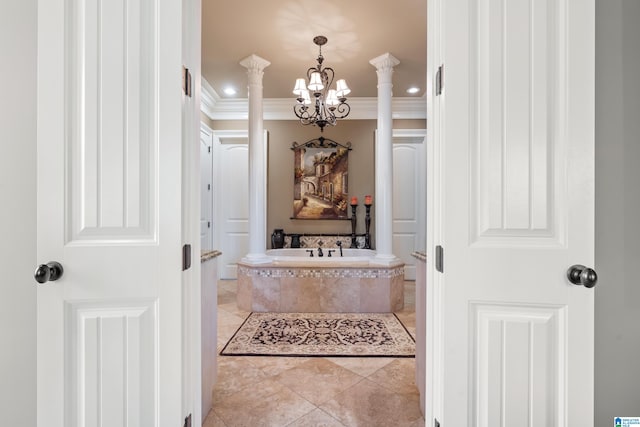 interior space with crown molding, ornate columns, a notable chandelier, and light tile patterned floors