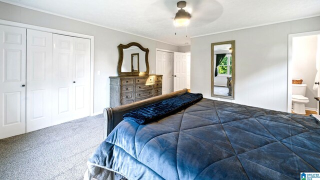 carpeted bedroom featuring ceiling fan, ensuite bathroom, and ornamental molding