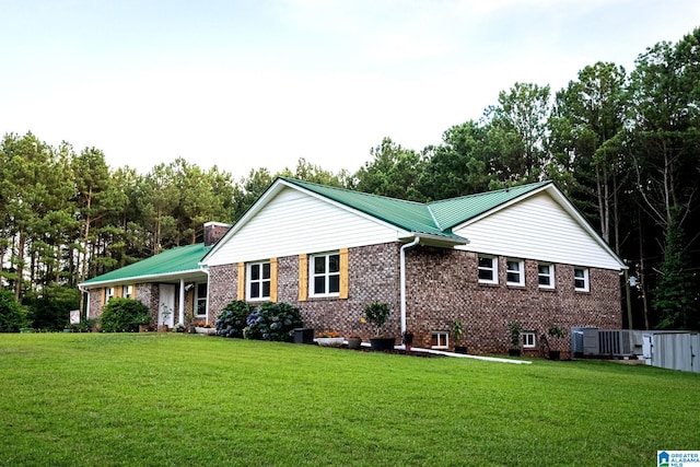 ranch-style house with a front lawn