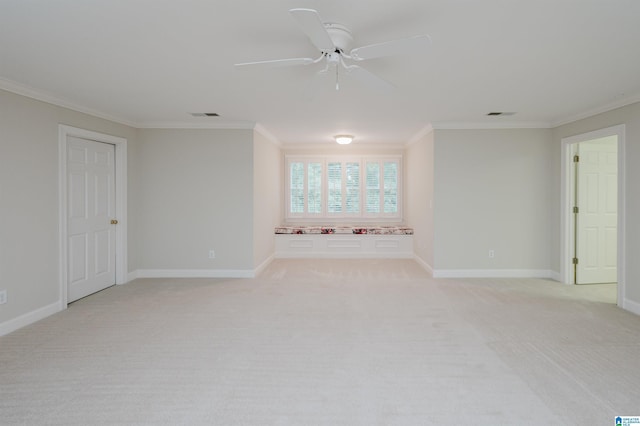 interior space featuring ceiling fan and ornamental molding