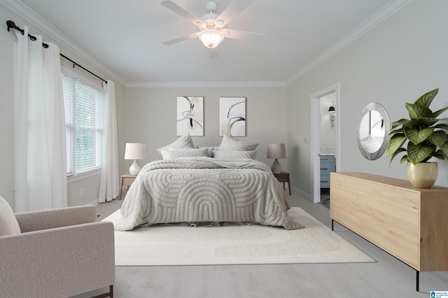 bedroom with ceiling fan, crown molding, connected bathroom, and carpet floors