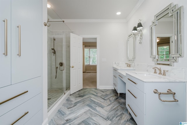 bathroom featuring vanity, a shower with door, ornamental molding, and parquet floors