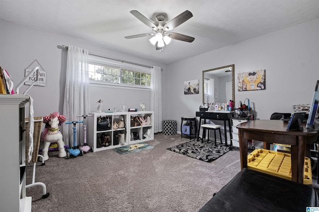 rec room featuring carpet floors and ceiling fan