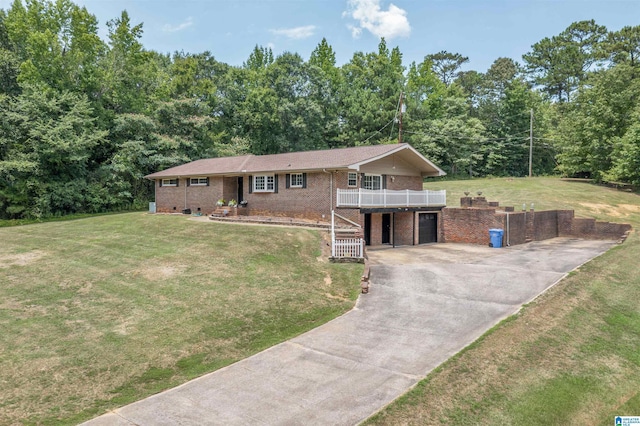 view of front of property with a garage and a front yard