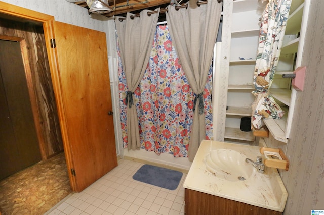 bathroom with vanity, tile patterned flooring, and shower / bathtub combination with curtain