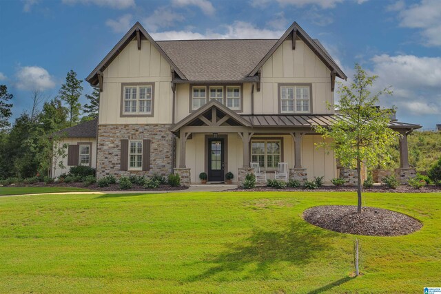 view of front of home with a front yard