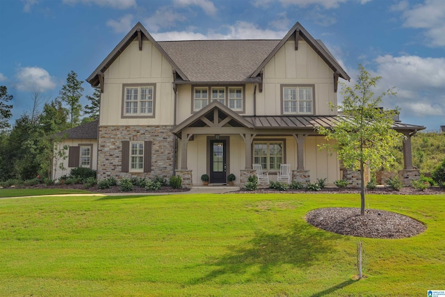 view of front of home with a front lawn and a porch