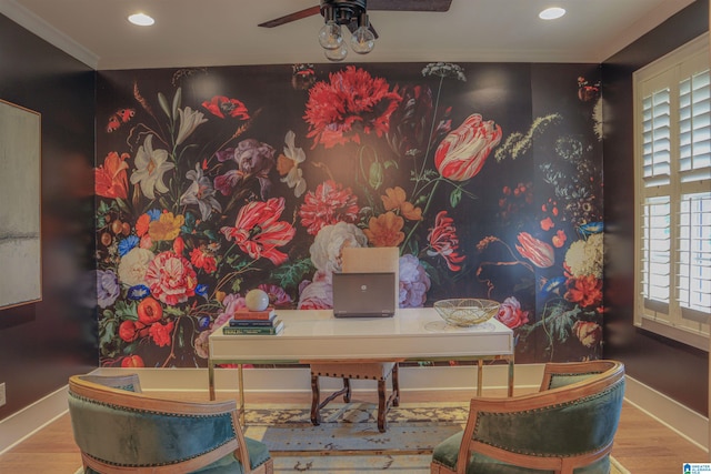 office with wood-type flooring, ornamental molding, and ceiling fan